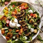 Pesto Chicken Caesar Salad with Tomatoes and Burrata